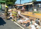 ¡Respuesta relámpago en la C1!  Intervención de bomberos sofocó incendio y salvan camión compactador